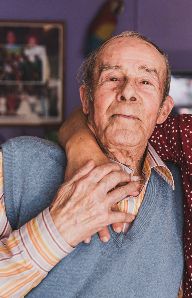 image of An older patient and their caregiver